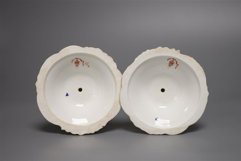 A pair of Royal Crown Derby candlesticks, height 15cm